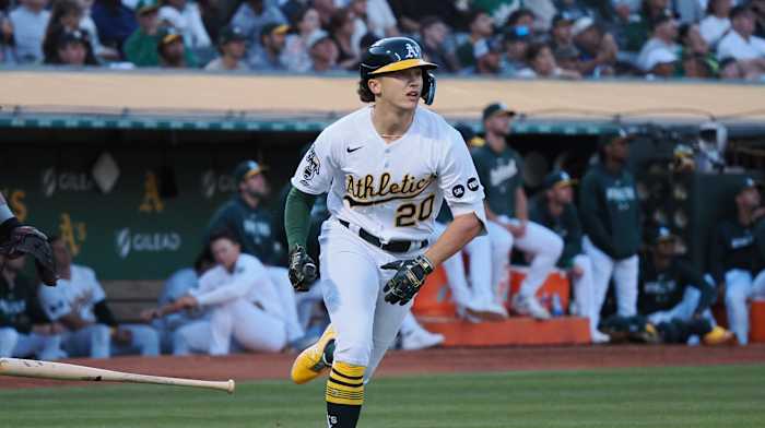 Oakland Athletics second baseman Zack Gelof (20) runs as he gets his first MLB hit with an RBI double against the Minnesota Twins during the third inning at Oakland-Alameda County Coliseum.